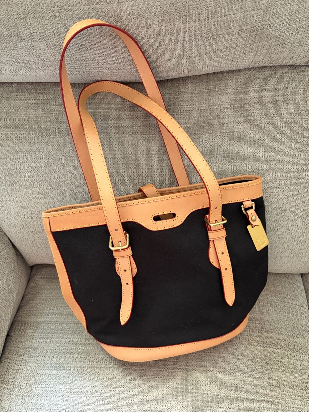Dooney & Bourke Black Canvas Tote with Tan Leather Trim and Gold Hardware